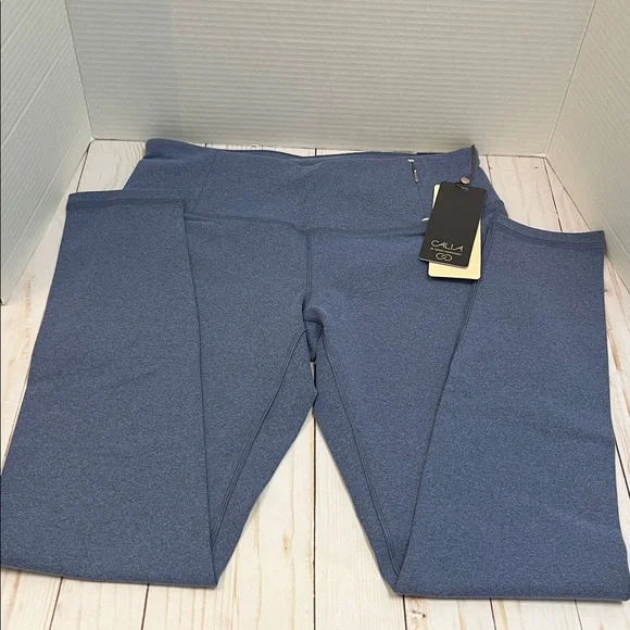 Calia Blue Leggings. Body freeze fabric. Front zip waist pocket.NWT. Size medium - Picture 2 of 7